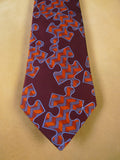 24/0275 new & unworn turnbull & asser Jermyn St. maroon blue jigsaw pattern 100% silk tie