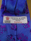 24/0278 new & unworn turnbull & asser Jermyn St. blue purple jigsaw pattern 100% silk tie