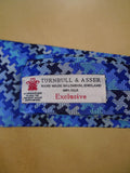 24/0283 new & unworn turnbull & asser Jermyn St. blue geometric pattern 100% silk tie
