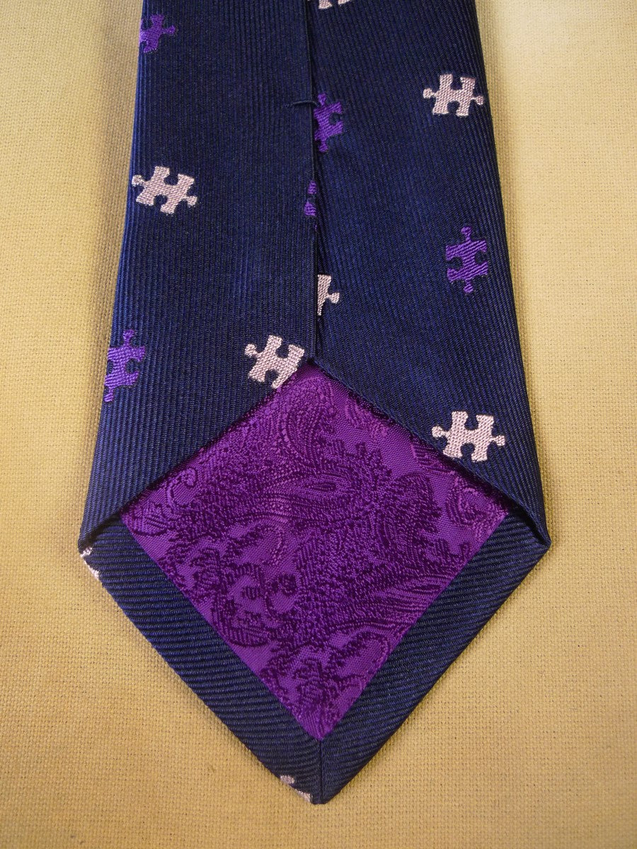 24/0266 new & unworn turnbull & asser Jermyn St. purple blue jigsaw pattern 100% silk tie