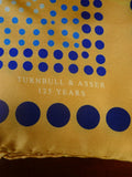 24/0316 Turnbull & asser Jermyn St. gold blue circle pattern 125 years anniversary all silk pocket square