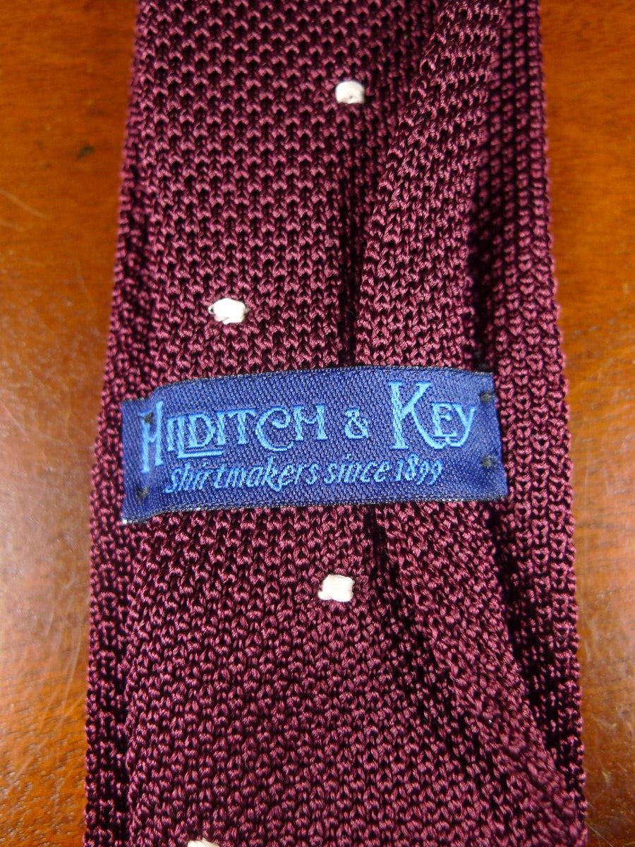 24/0352 New & unworn Hilditch & key maroon polka dot woven 100% silk tie