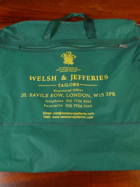 25/0478 welsh & jefferies savile row bespoke green / gold woven suit bag carrier