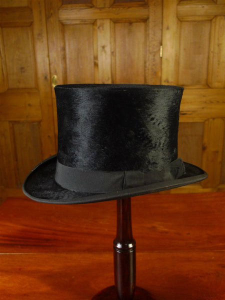 25/0829 vintage antique british black silk top hat 57 cms