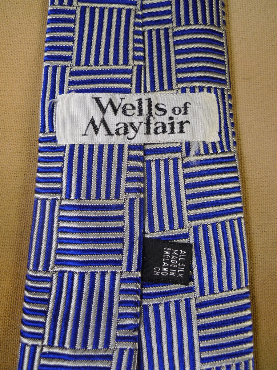 24/0172 immaculate wells of mayfair blue silver 100% silk tie