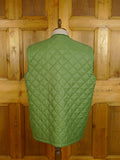 25/0338 immaculate husky green quilted shooting vest gilet 50 long