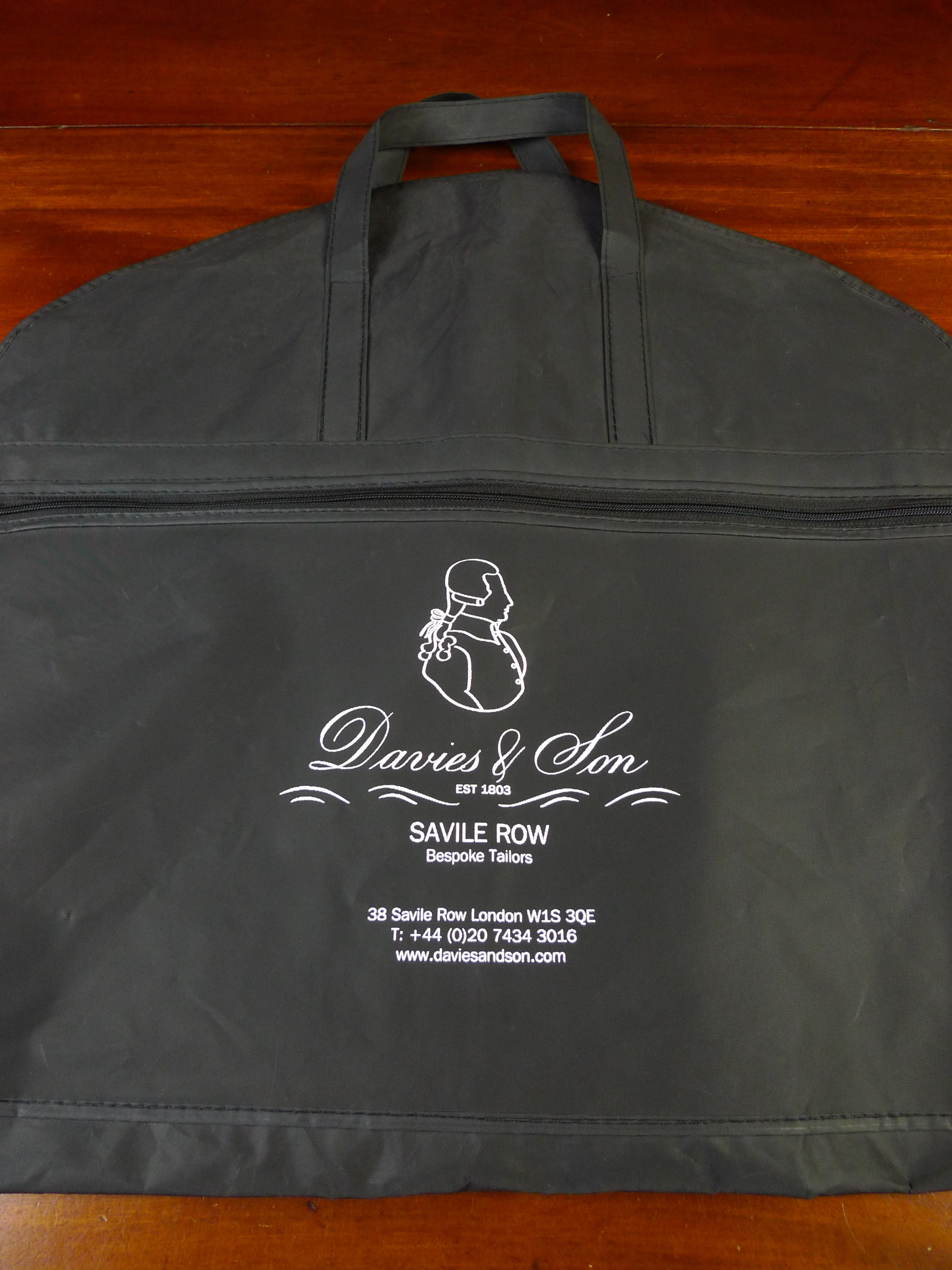 25/0482 davies & son savile row bespoke black woven plastic suit bag carrier