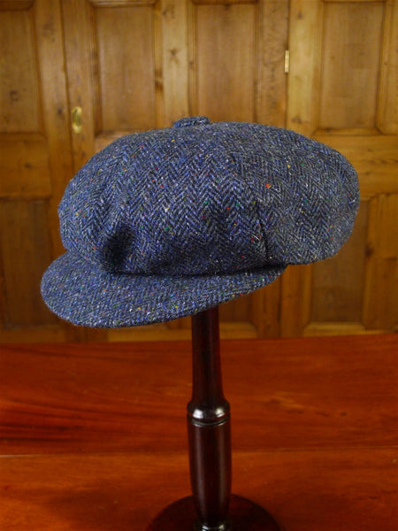 25/0837 immaculate blue herringbone donegal tweed flat cap 60 cms
