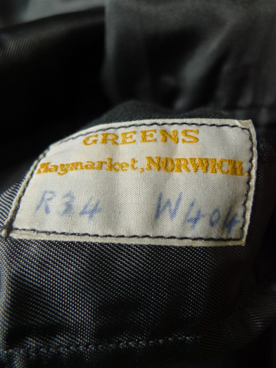 25/1082 beautiful 1950s vintage west of england grey grey herringbone wool overcoat raincoat w/ gauntlet cuff 38-39