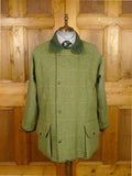 26/0235 immaculate extra-heavyweight isaac walton's custom grade green wp check shooting field coat 44
