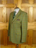 26/0822 musto performance green wp check tweed shooting jacket w/ action back 44 regular to long