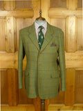 26/0822 musto performance green wp check tweed shooting jacket w/ action back 44 regular to long