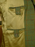 26/0822 musto performance green wp check tweed shooting jacket w/ action back 44 regular to long